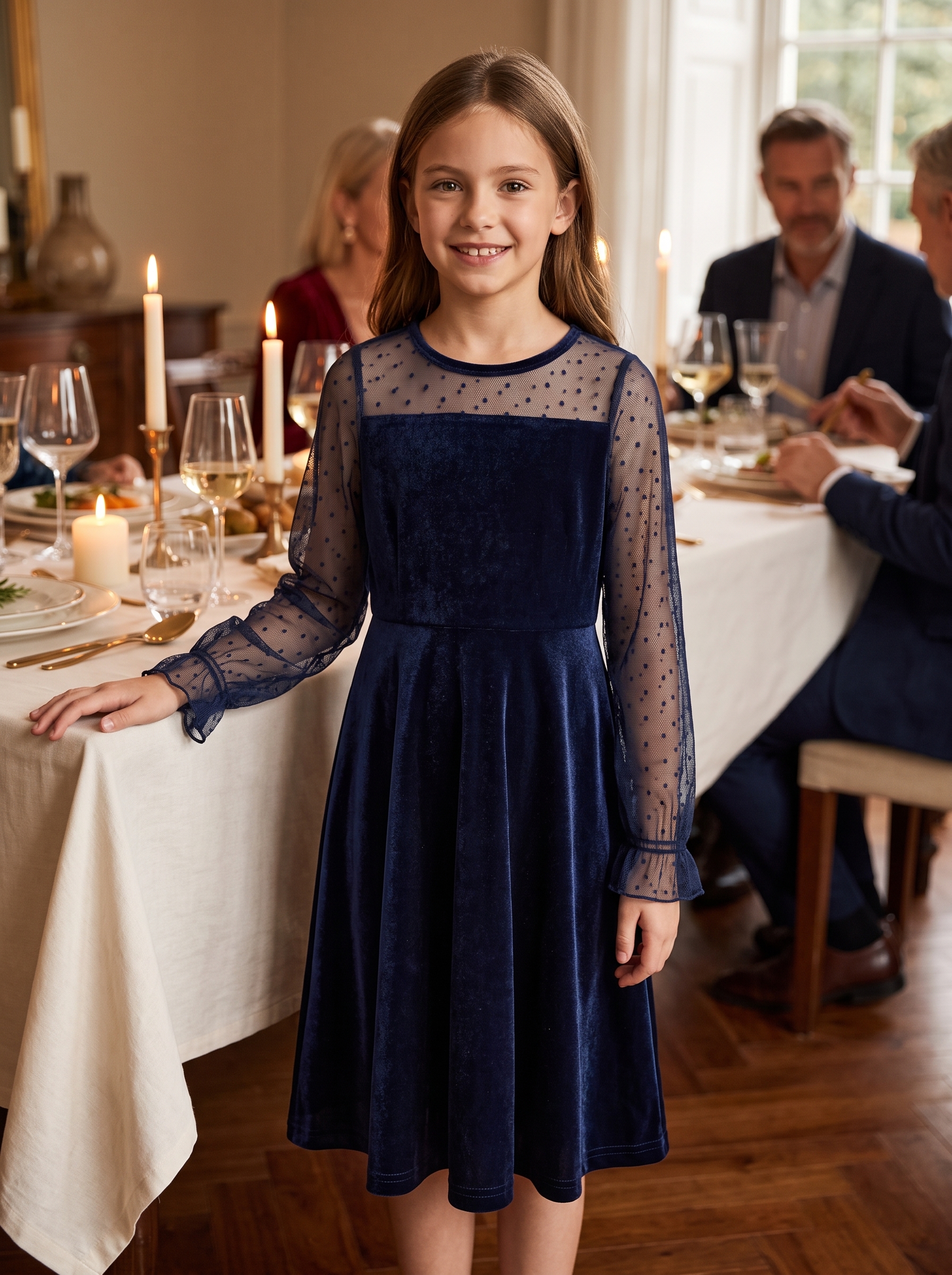 Girl wearing a navy FREELYVE occasion dress